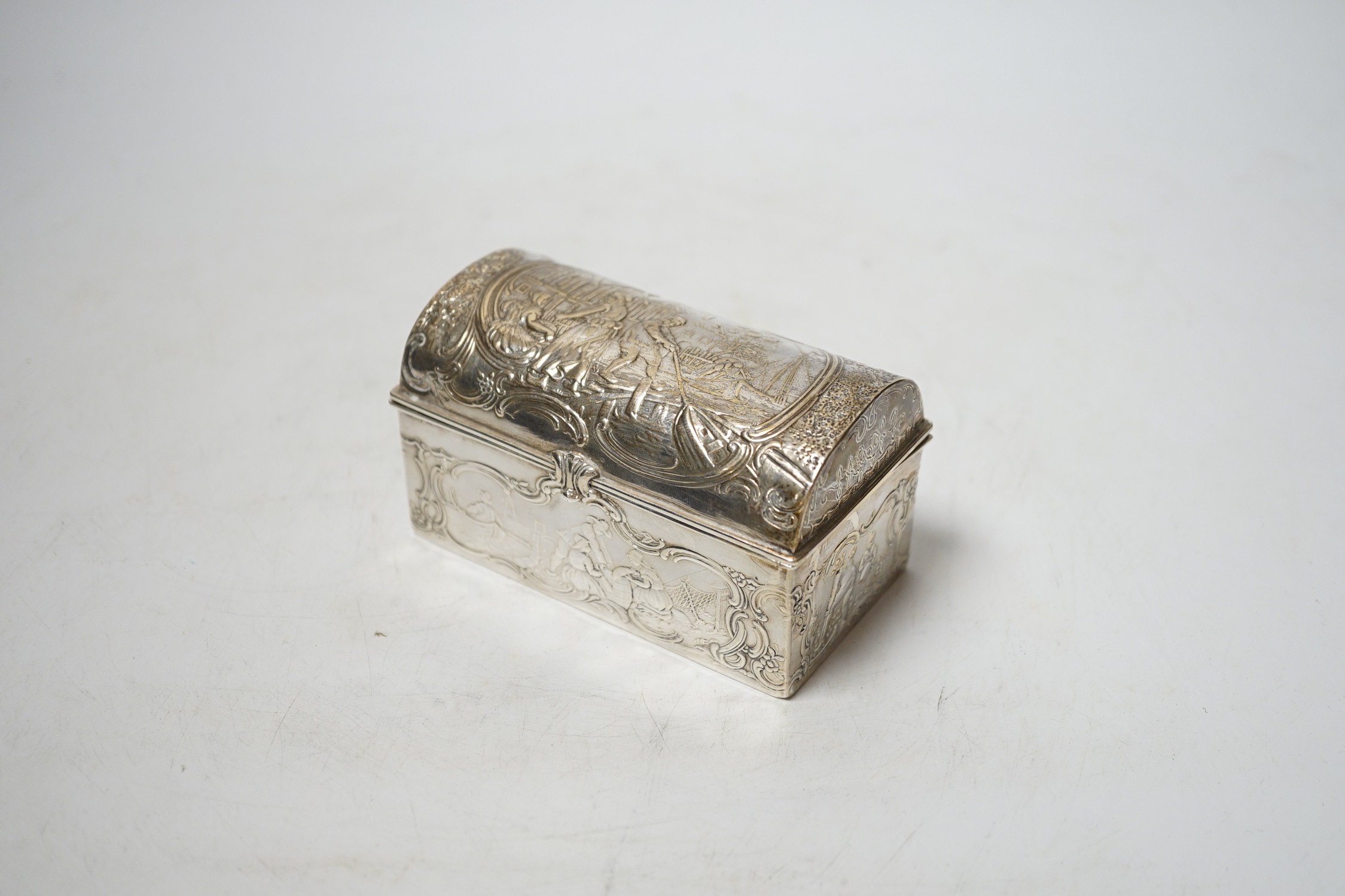 An early 20th century repousse Hanau silver box, modelled as a travelling trunk, import marks for Berthold Muller, Chester, 1903, width, 10cm.